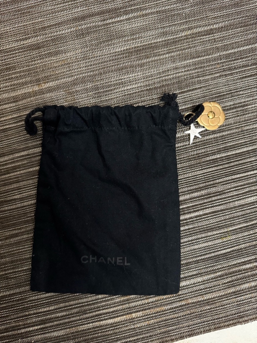 CHANEL Black Drawstring Dust Bag with Gold Camellia & Silver Star Charms